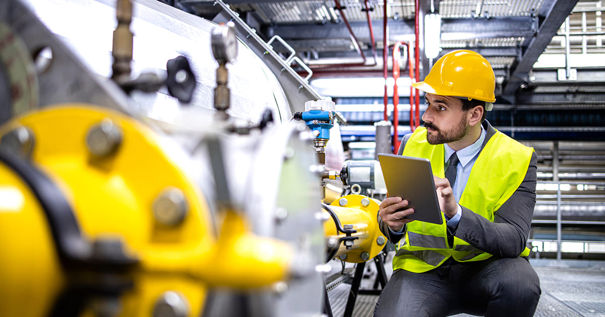 Oil and Gas Production Manager or Supervisor with Digital Tablet (1).jpg